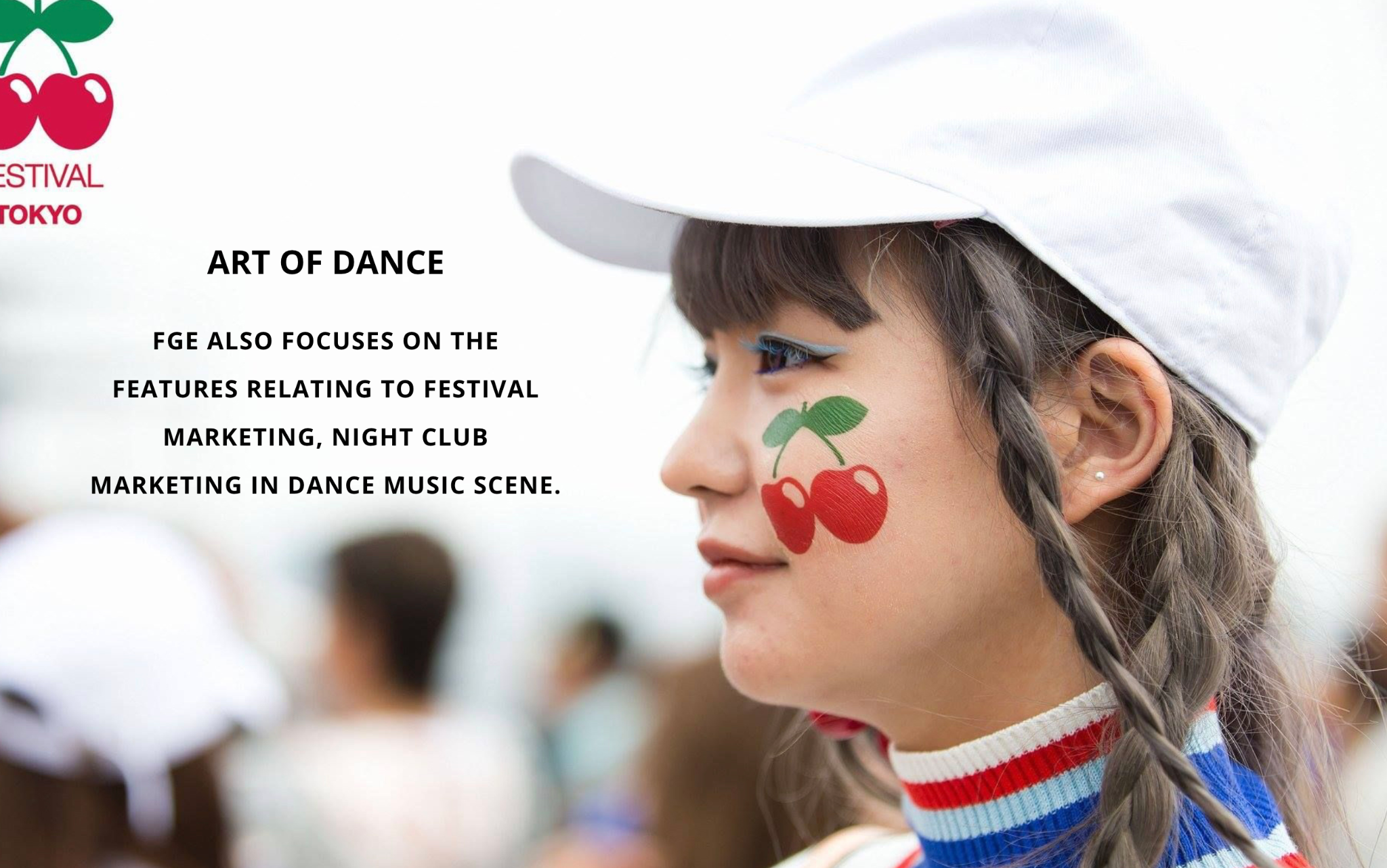 A festival guest wearing Pacha cherry face paint and a white cap